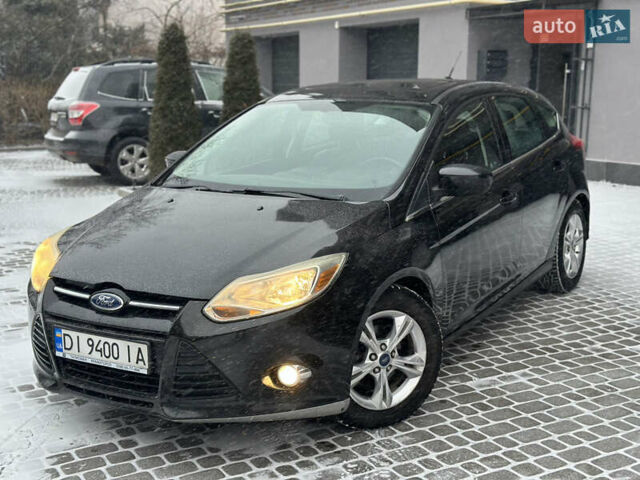 Чорний Форд Фокус, об'ємом двигуна 2 л та пробігом 164 тис. км за 6299 $, фото 1 на Automoto.ua