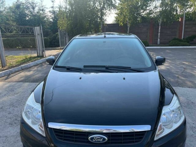 Черный Форд Фокус, объемом двигателя 1.4 л и пробегом 135 тыс. км за 5000 $, фото 2 на Automoto.ua