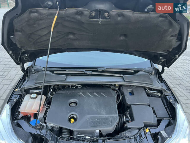 Черный Форд Фокус, объемом двигателя 1.6 л и пробегом 219 тыс. км за 7800 $, фото 13 на Automoto.ua