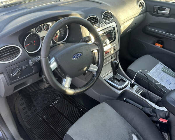 Черный Форд Фокус, объемом двигателя 2 л и пробегом 410 тыс. км за 3999 $, фото 7 на Automoto.ua