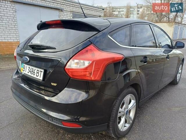 Черный Форд Фокус, объемом двигателя 1.6 л и пробегом 156 тыс. км за 7700 $, фото 3 на Automoto.ua