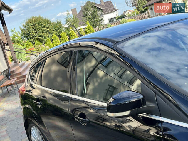 Черный Форд Фокус, объемом двигателя 1.6 л и пробегом 250 тыс. км за 8299 $, фото 26 на Automoto.ua