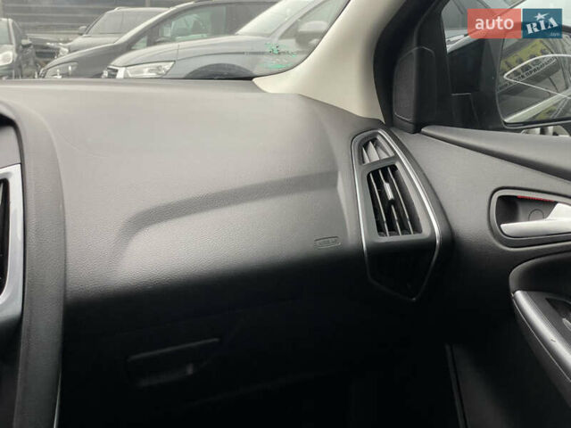 Чорний Форд Фокус, об'ємом двигуна 1 л та пробігом 170 тис. км за 6500 $, фото 27 на Automoto.ua