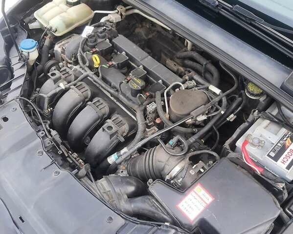 Чорний Форд Фокус, об'ємом двигуна 2 л та пробігом 312 тис. км за 7650 $, фото 11 на Automoto.ua