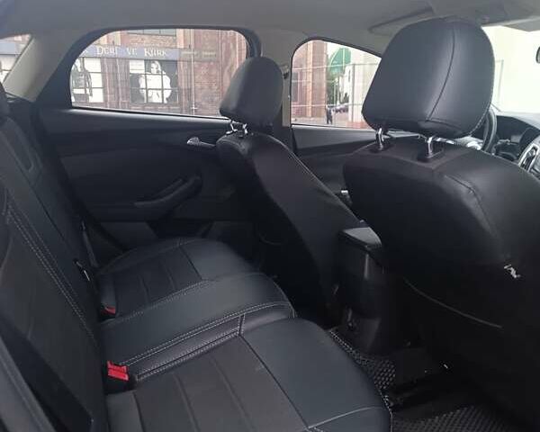 Черный Форд Фокус, объемом двигателя 2 л и пробегом 159 тыс. км за 4500 $, фото 2 на Automoto.ua