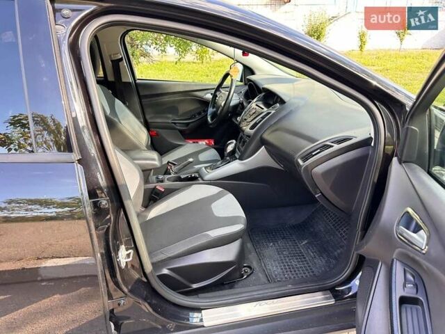 Чорний Форд Фокус, об'ємом двигуна 2 л та пробігом 198 тис. км за 7400 $, фото 23 на Automoto.ua