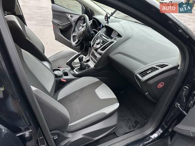 Черный Форд Фокус, объемом двигателя 1.6 л и пробегом 162 тыс. км за 7300 $, фото 17 на Automoto.ua