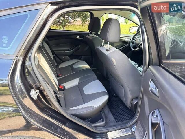 Чорний Форд Фокус, об'ємом двигуна 2 л та пробігом 198 тис. км за 7400 $, фото 22 на Automoto.ua