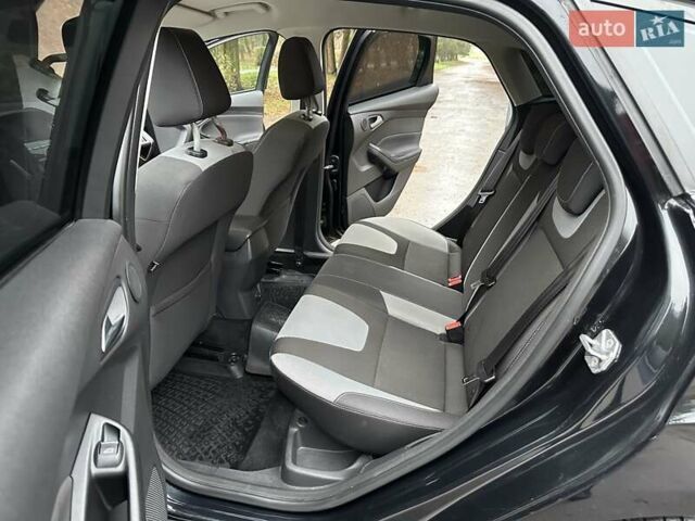 Черный Форд Фокус, объемом двигателя 1.6 л и пробегом 162 тыс. км за 7300 $, фото 18 на Automoto.ua