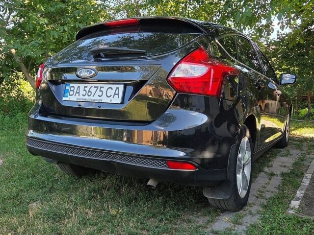 Чорний Форд Фокус, об'ємом двигуна 2 л та пробігом 165 тис. км за 7400 $, фото 6 на Automoto.ua