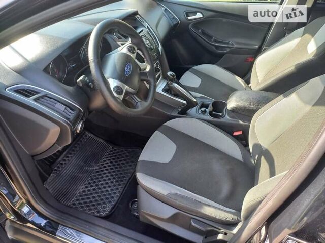 Черный Форд Фокус, объемом двигателя 1.6 л и пробегом 195 тыс. км за 7999 $, фото 11 на Automoto.ua