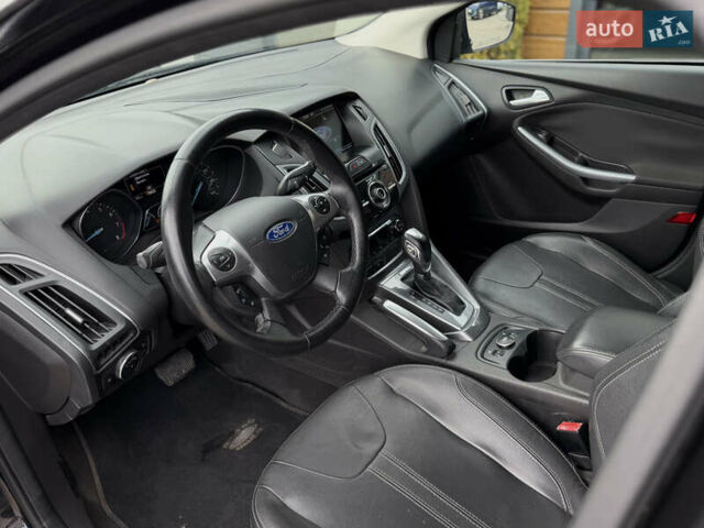 Чорний Форд Фокус, об'ємом двигуна 2 л та пробігом 169 тис. км за 7450 $, фото 27 на Automoto.ua