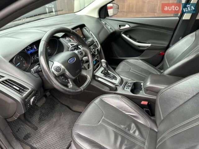 Черный Форд Фокус, объемом двигателя 2 л и пробегом 211 тыс. км за 6950 $, фото 13 на Automoto.ua