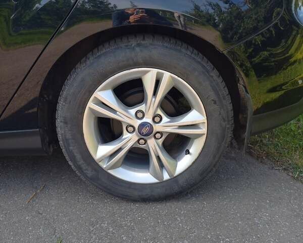 Черный Форд Фокус, объемом двигателя 1.6 л и пробегом 195 тыс. км за 7999 $, фото 9 на Automoto.ua