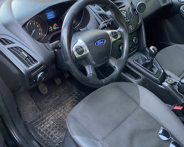 Черный Форд Фокус, объемом двигателя 1 л и пробегом 167 тыс. км за 4700 $, фото 5 на Automoto.ua