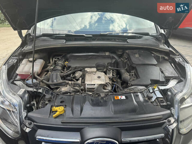 Черный Форд Фокус, объемом двигателя 1 л и пробегом 110 тыс. км за 6500 $, фото 2 на Automoto.ua
