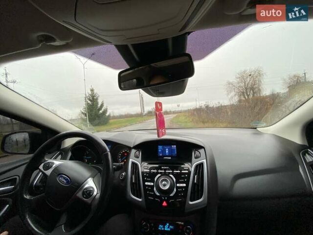 Чорний Форд Фокус, об'ємом двигуна 1.6 л та пробігом 179 тис. км за 8300 $, фото 6 на Automoto.ua