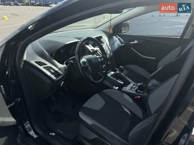 Черный Форд Фокус, объемом двигателя 1 л и пробегом 110 тыс. км за 6500 $, фото 6 на Automoto.ua