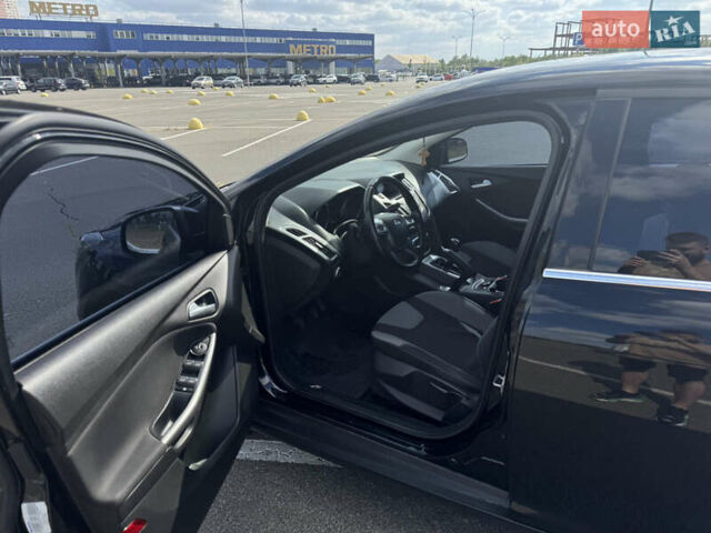 Черный Форд Фокус, объемом двигателя 1 л и пробегом 110 тыс. км за 6500 $, фото 7 на Automoto.ua