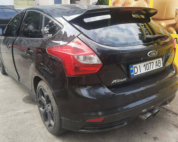 Черный Форд Фокус, объемом двигателя 2 л и пробегом 225 тыс. км за 7800 $, фото 2 на Automoto.ua