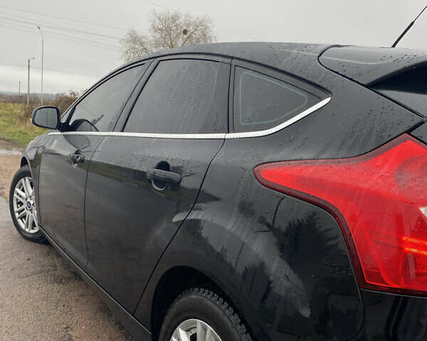 Чорний Форд Фокус, об'ємом двигуна 1.6 л та пробігом 179 тис. км за 8300 $, фото 4 на Automoto.ua