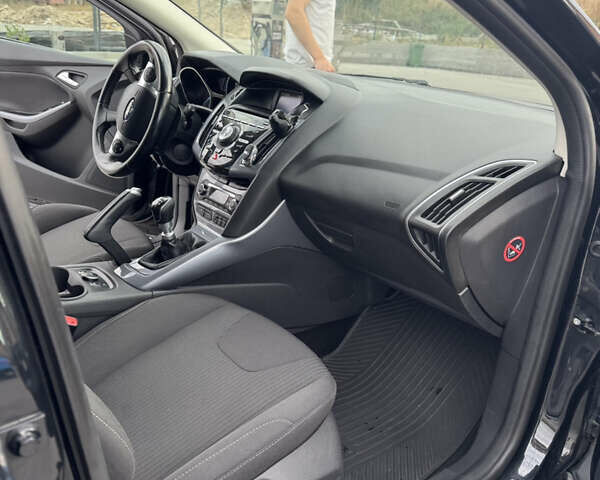 Чорний Форд Фокус, об'ємом двигуна 1 л та пробігом 150 тис. км за 8700 $, фото 11 на Automoto.ua