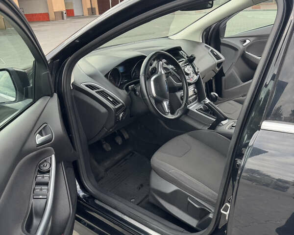 Чорний Форд Фокус, об'ємом двигуна 1 л та пробігом 150 тис. км за 8700 $, фото 9 на Automoto.ua