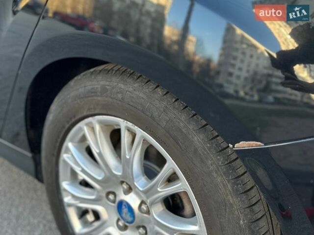 Черный Форд Фокус, объемом двигателя 1 л и пробегом 108 тыс. км за 8700 $, фото 20 на Automoto.ua