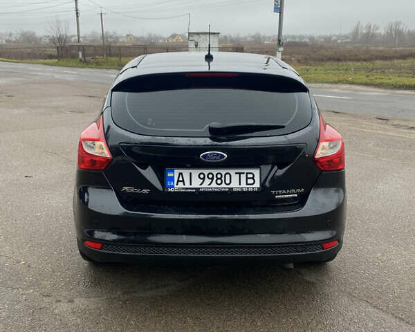 Чорний Форд Фокус, об'ємом двигуна 2 л та пробігом 190 тис. км за 8700 $, фото 3 на Automoto.ua