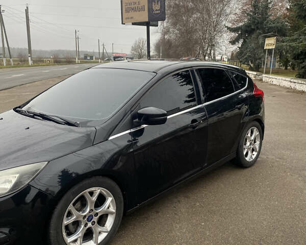 Чорний Форд Фокус, об'ємом двигуна 2 л та пробігом 190 тис. км за 8700 $, фото 1 на Automoto.ua