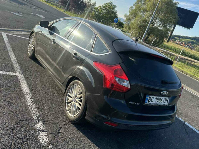 Чорний Форд Фокус, об'ємом двигуна 2 л та пробігом 170 тис. км за 7500 $, фото 2 на Automoto.ua