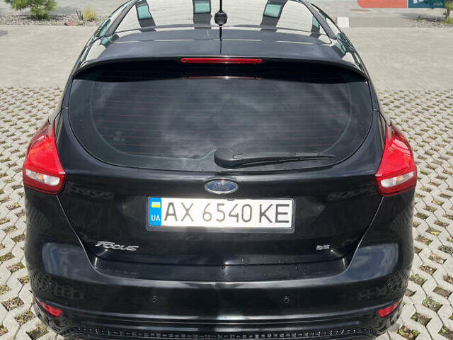 Чорний Форд Фокус, об'ємом двигуна 2 л та пробігом 176 тис. км за 7500 $, фото 4 на Automoto.ua