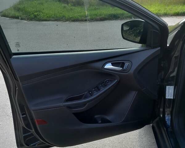 Черный Форд Фокус, объемом двигателя 2 л и пробегом 202 тыс. км за 7500 $, фото 16 на Automoto.ua