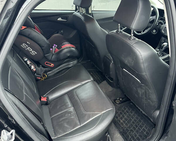 Чорний Форд Фокус, об'ємом двигуна 2 л та пробігом 203 тис. км за 7950 $, фото 9 на Automoto.ua