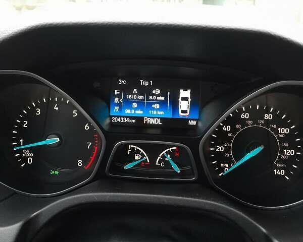 Черный Форд Фокус, объемом двигателя 2 л и пробегом 205 тыс. км за 7500 $, фото 13 на Automoto.ua