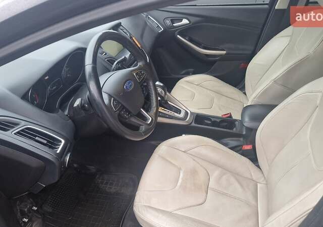 Чорний Форд Фокус, об'ємом двигуна 2 л та пробігом 127 тис. км за 10800 $, фото 4 на Automoto.ua