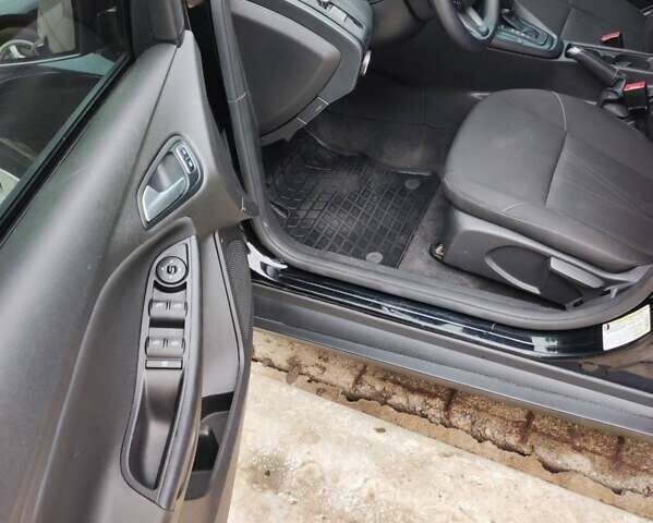 Чорний Форд Фокус, об'ємом двигуна 2 л та пробігом 191 тис. км за 9500 $, фото 56 на Automoto.ua