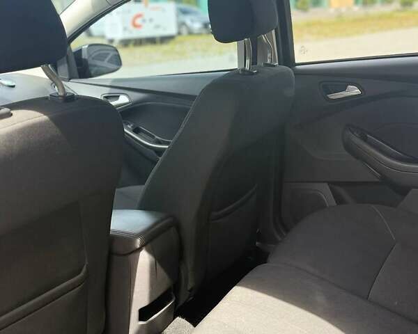 Черный Форд Фокус, объемом двигателя 1 л и пробегом 70 тыс. км за 8200 $, фото 14 на Automoto.ua