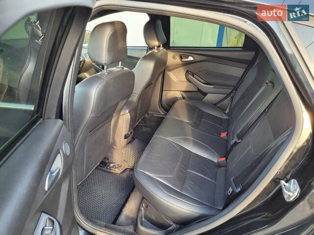Черный Форд Фокус, объемом двигателя 2 л и пробегом 102 тыс. км за 11000 $, фото 10 на Automoto.ua