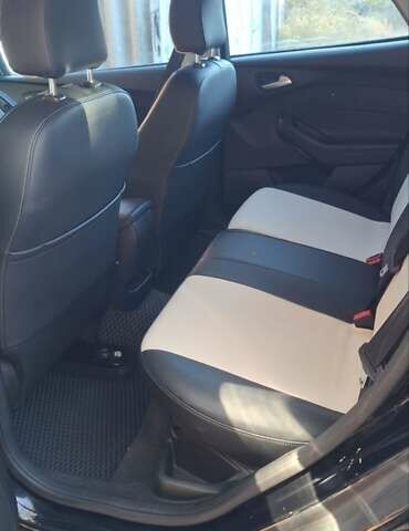 Чорний Форд Фокус, об'ємом двигуна 2 л та пробігом 139 тис. км за 9300 $, фото 4 на Automoto.ua