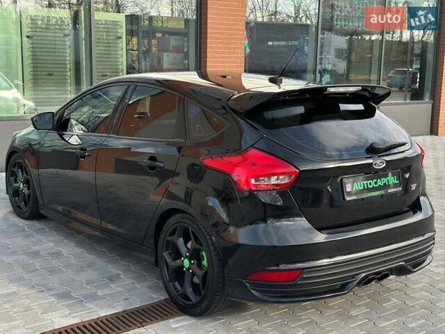 Чорний Форд Фокус, об'ємом двигуна 2 л та пробігом 123 тис. км за 12990 $, фото 12 на Automoto.ua
