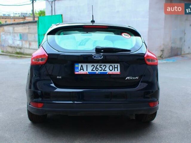 Чорний Форд Фокус, об'ємом двигуна 2 л та пробігом 86 тис. км за 9400 $, фото 4 на Automoto.ua