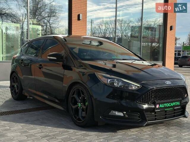 Чорний Форд Фокус, об'ємом двигуна 2 л та пробігом 123 тис. км за 12990 $, фото 1 на Automoto.ua