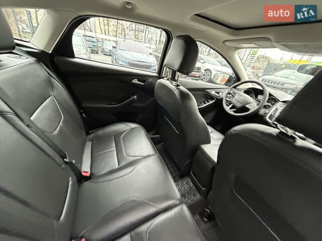 Чорний Форд Фокус, об'ємом двигуна 2 л та пробігом 88 тис. км за 11000 $, фото 24 на Automoto.ua