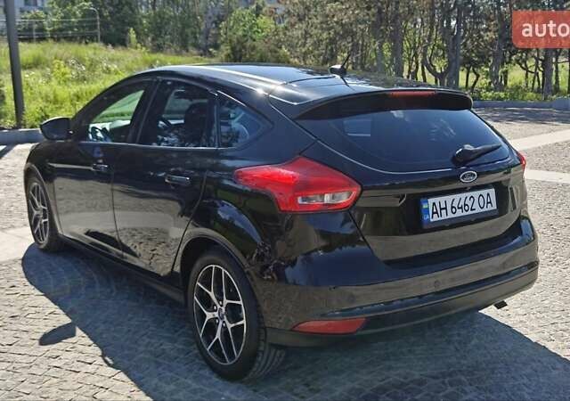 Чорний Форд Фокус, об'ємом двигуна 2 л та пробігом 114 тис. км за 9800 $, фото 4 на Automoto.ua