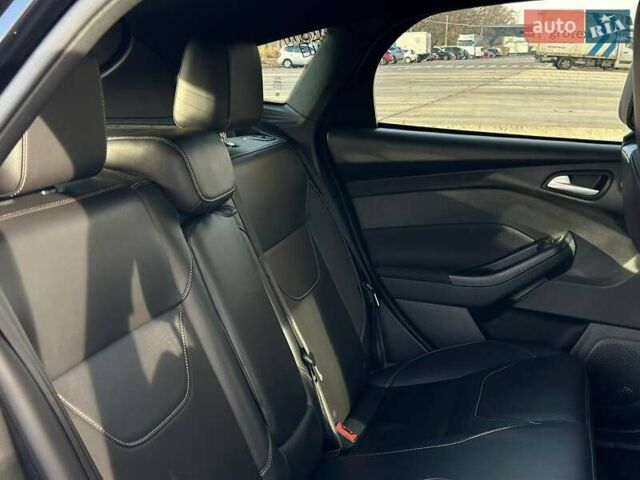 Чорний Форд Фокус, об'ємом двигуна 2 л та пробігом 123 тис. км за 12990 $, фото 26 на Automoto.ua