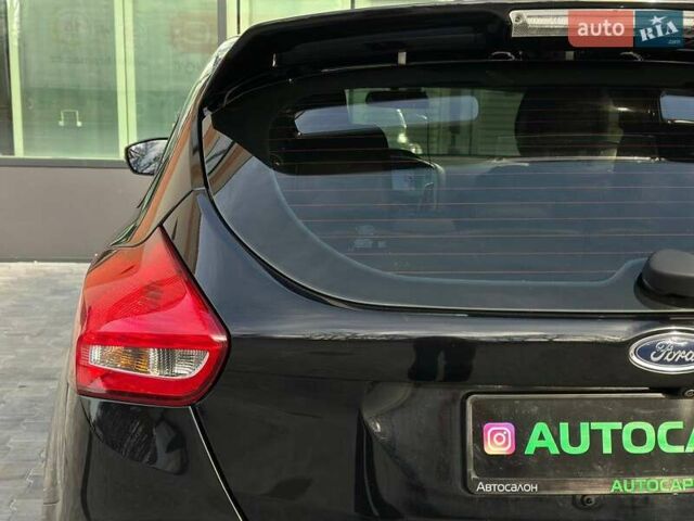 Чорний Форд Фокус, об'ємом двигуна 2 л та пробігом 123 тис. км за 12990 $, фото 9 на Automoto.ua