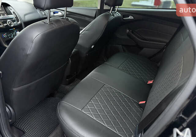 Черный Форд Фокус, объемом двигателя 2 л и пробегом 139 тыс. км за 8700 $, фото 9 на Automoto.ua