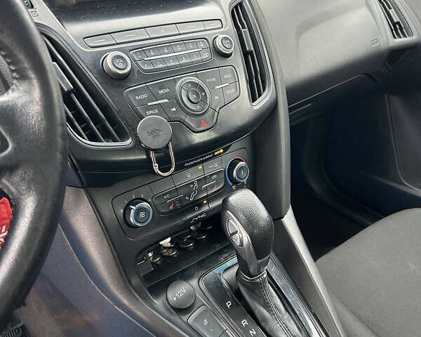 Чорний Форд Фокус, об'ємом двигуна 2 л та пробігом 141 тис. км за 7400 $, фото 7 на Automoto.ua