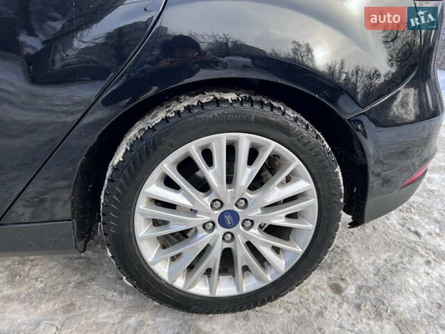 Черный Форд Фокус, объемом двигателя 2 л и пробегом 160 тыс. км за 9900 $, фото 12 на Automoto.ua
